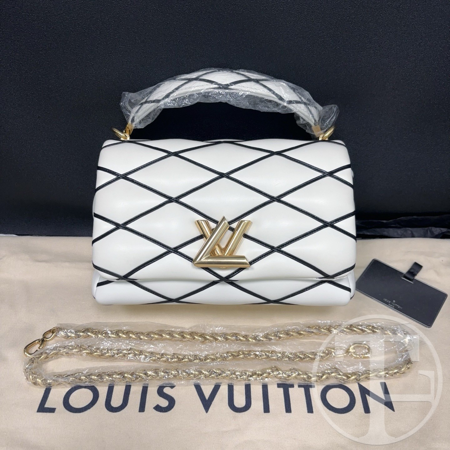 louis vuitton go 14 black and white diamond quilted lambskin medium bag louis vuitton go 14 black and white diamond quilted lambskin medium bag