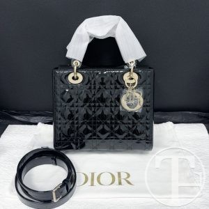 dior lady dior bag in black patent calfskin with gold hardware and five compartments
