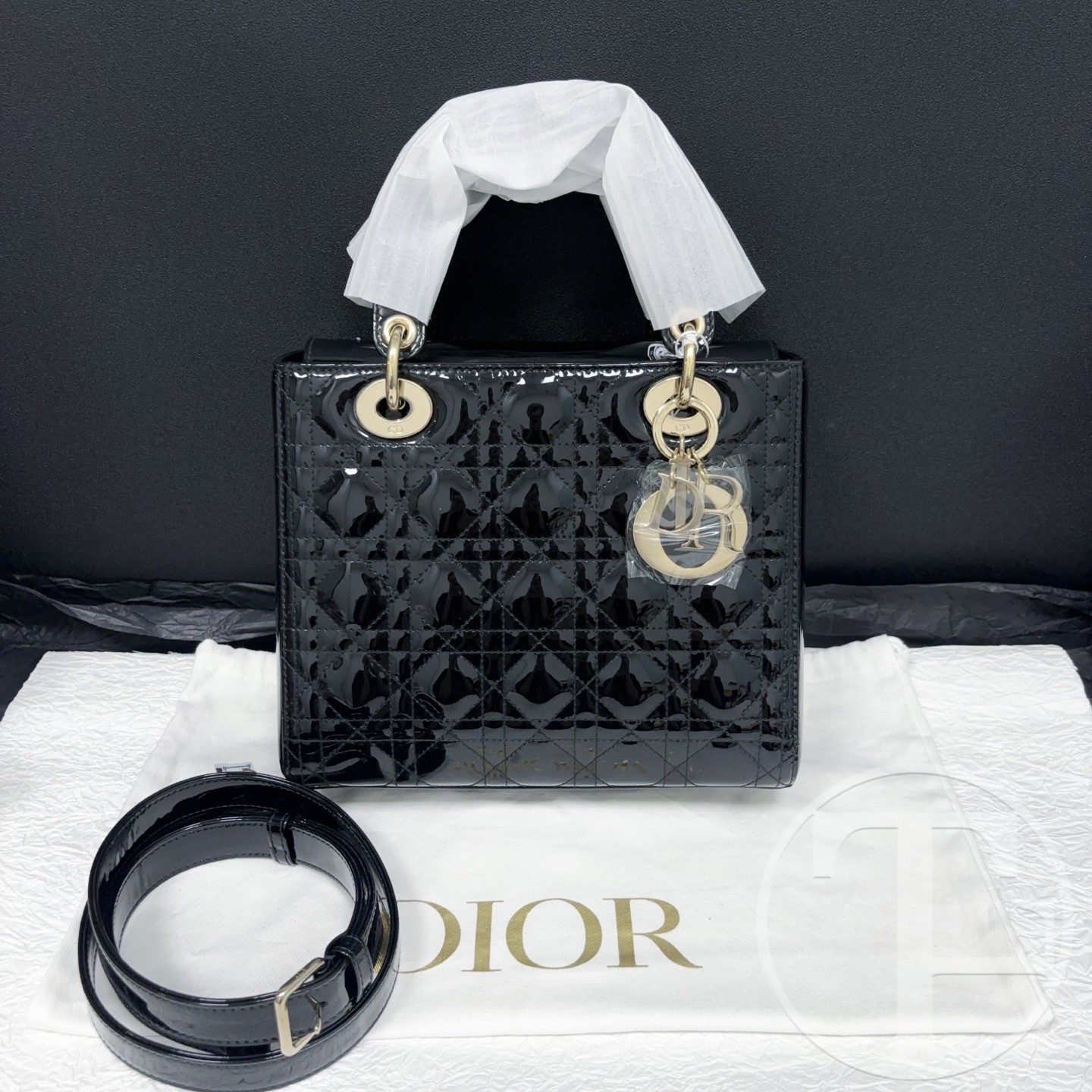 dior lady dior bag in black patent calfskin with gold hardware and five compartments dior lady dior bag in black patent calfskin with gold hardware and five compartments